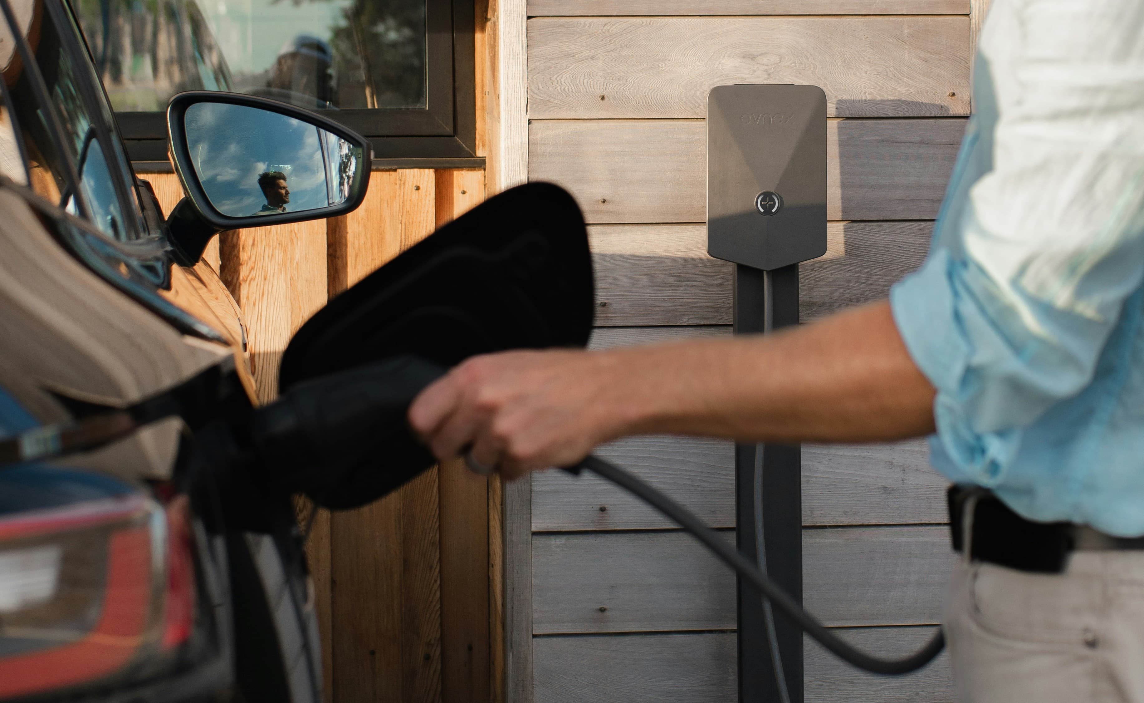 Modern EV charger installation in a commercial parking lot